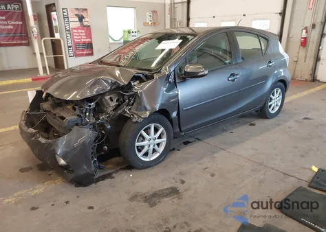 2012 Toyota Prius C Four z USA, uszkodzony, nr VIN JTDKDTB3XC1525748